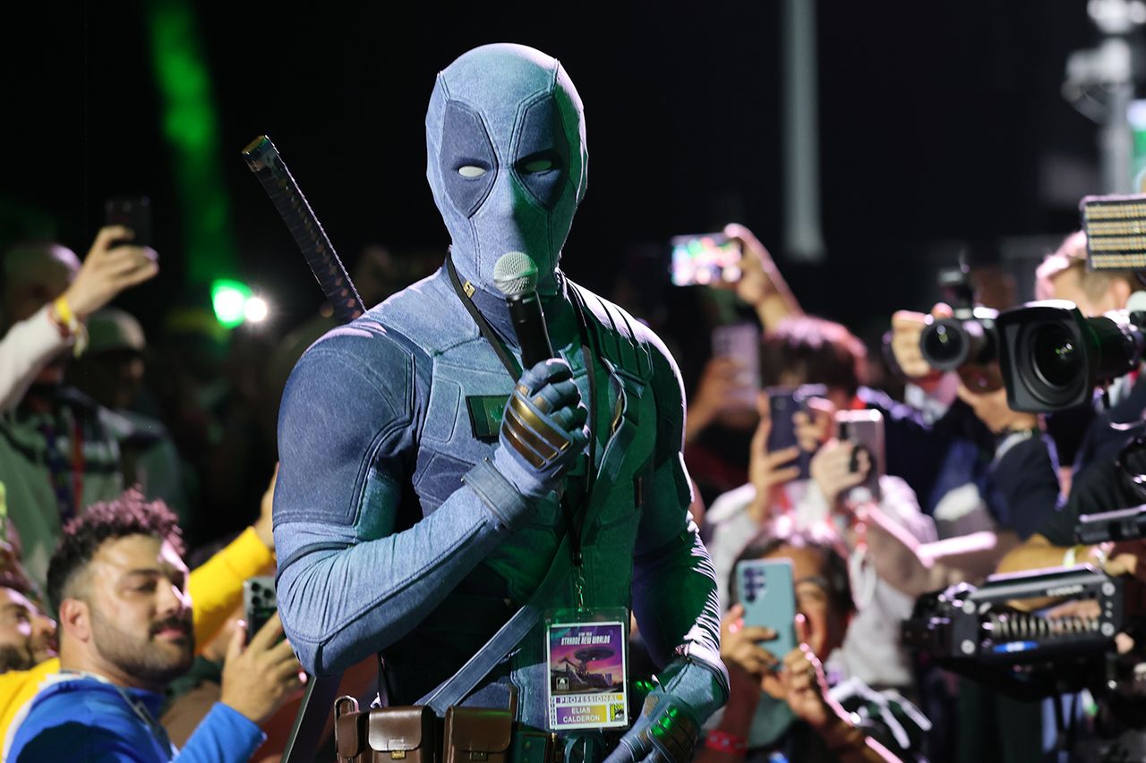 Ryan Reynolds in Deadpool cosplay speaks during the 2026 Comic-Con International: San Diego - Marvel Studios Hall H presentation at San Diego Convention Center on July 25, 2026 in San Diego, California. Ryan Reynolds in Deadpool cosplay at Comic-ConCredit: Amy Sussman/Getty