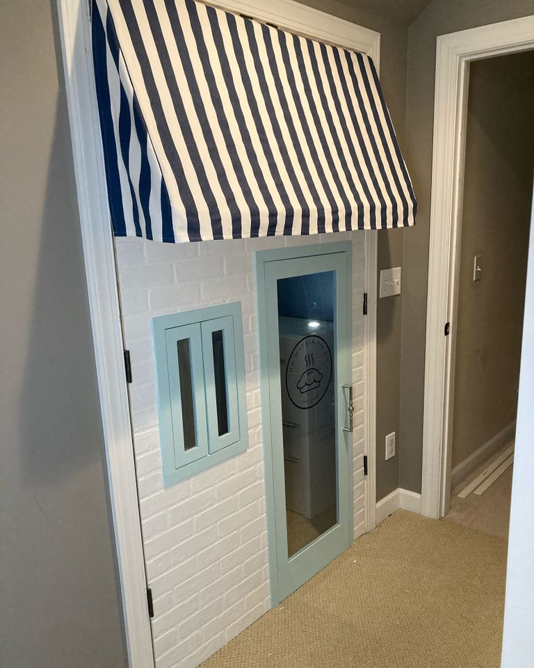 Mathis created a pie shop playhouse for her children, built into the door of a closet in her home.Credit: Sara Mathis