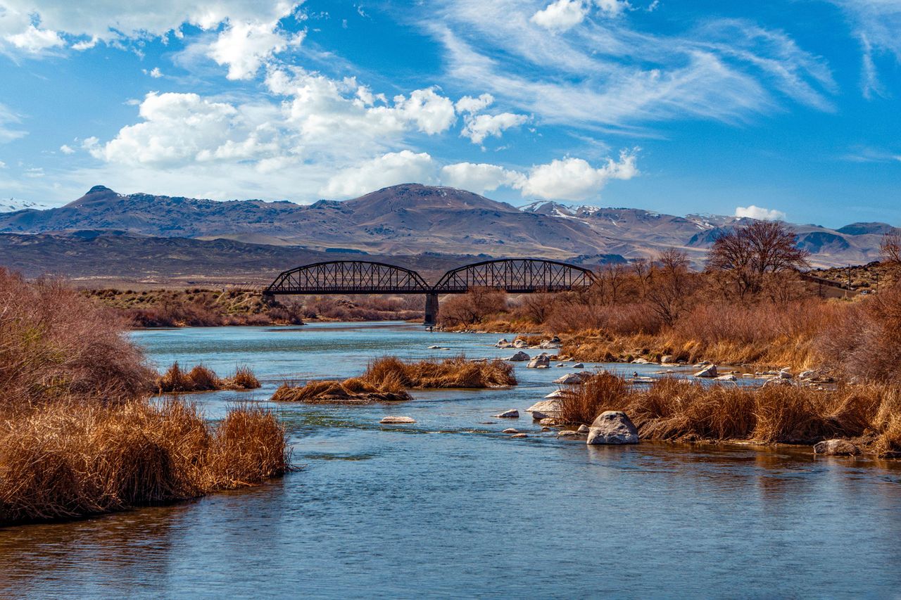 The Snake River flows past Celebration Park, Idaho's first archaeological park near the historic Guffey Bridge in southwest Idaho; early spring. A stock photo of Idaho’s Snake RiverCredit: Alamy