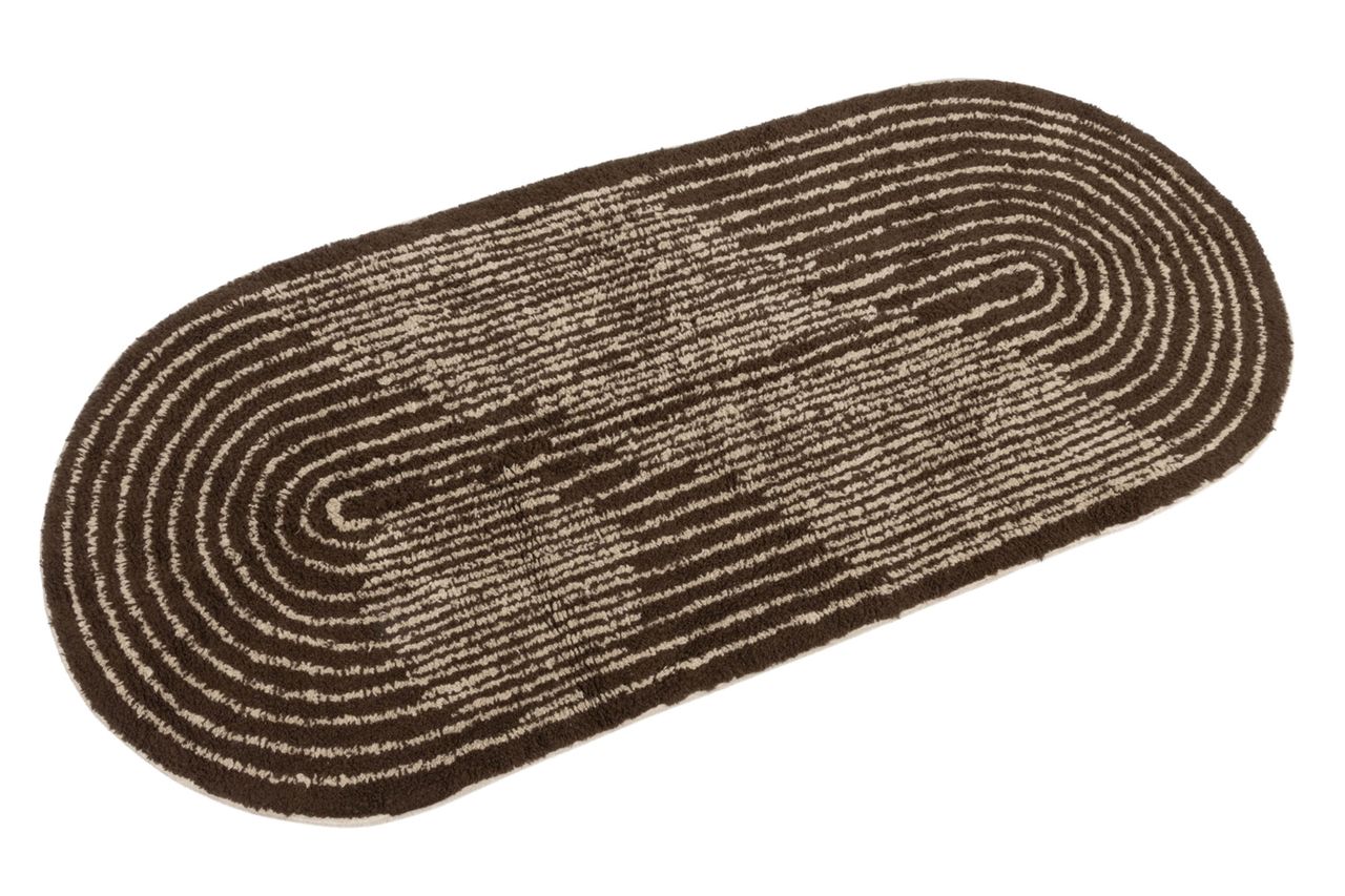 Nordstrom Storied Home Modern Oval Cotton Tufted Rug Credit: Nordstrom