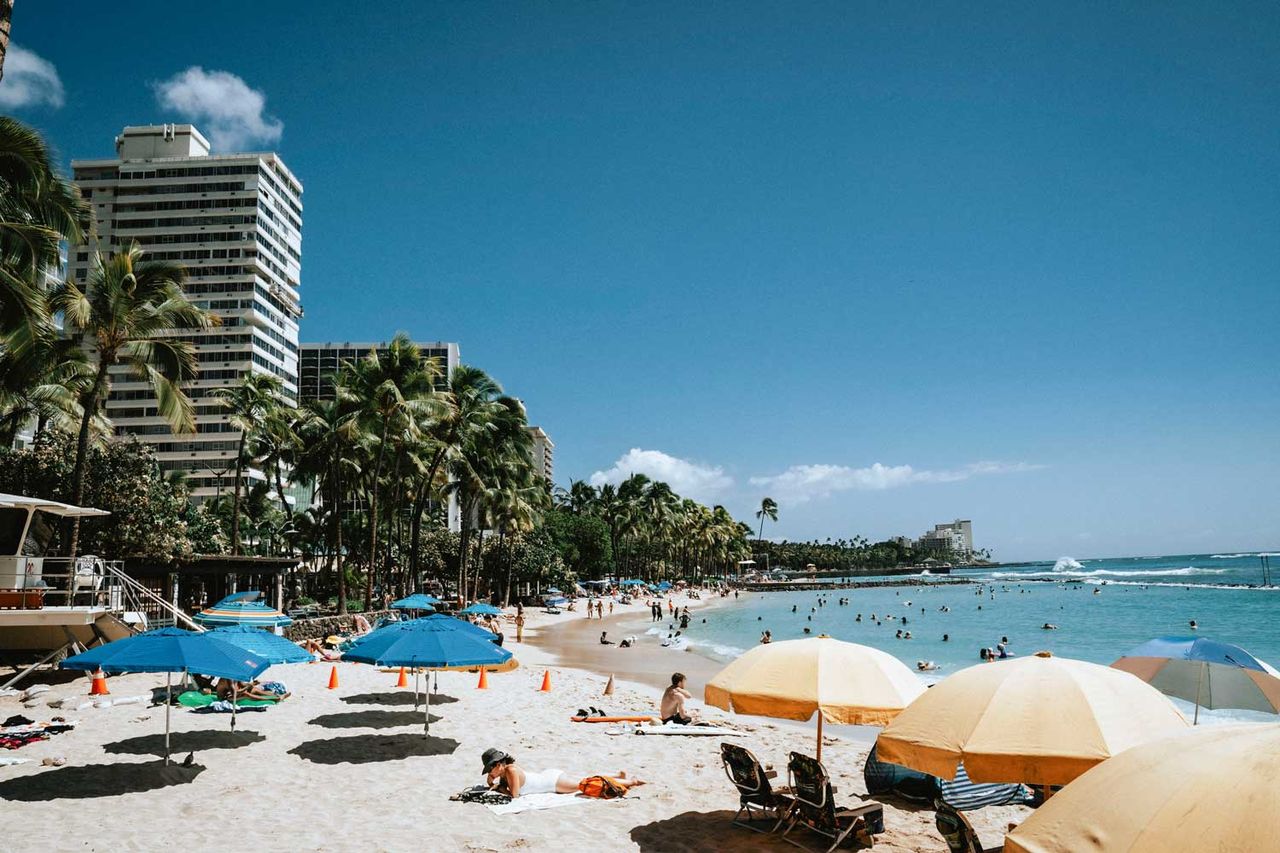 People sunbathe under umbrellas on Waikiki Beach on Monday, Sept. 22, 2025, in Honolulu, HI. The shoreline is among the busiest in Hawai Waikiki Beach photographed on Sept. 22, 2025Credit: Mengshin Lin for The Washington Post via Getty