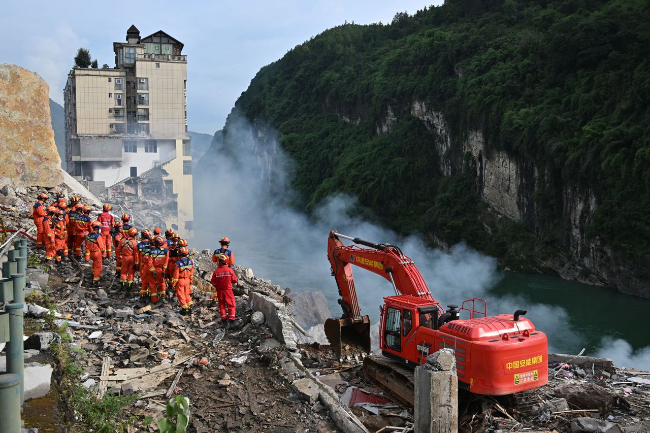 Rescue workers search for survivors at the site of a landslide in Hanjia Street along the Wujiang River Rescue workers search for survivors at the site of a landslide in Chongqing, China.Credit: He Penglei/China News Service/VCG via Getty
