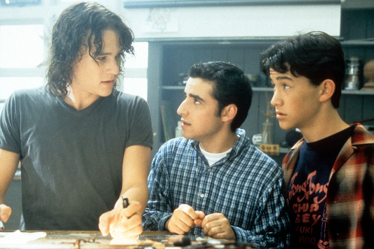 Heath Ledger, David Krumholtz, and Joseph Gordon-Levitt standing at table in a scene from the film '10 Things I Hate About You', 1999. Heath Ledger, David Krumholtz, and Joseph Gordon-Levitt standing at table in a scene from the film ‘10 Things I Hate About You’, 1999.Credit: Buena Vista/Getty