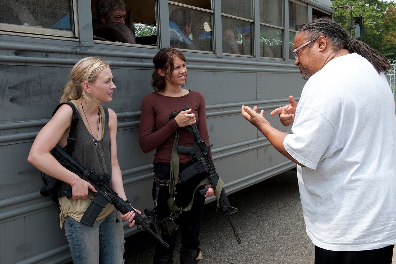 Emily Kinney and Lauren Cohan behind-the-scenes of season 4, episode 8 of ‘The Walking Dead’ with director Ernest Dickerson.Credit: Gene Page/AMC