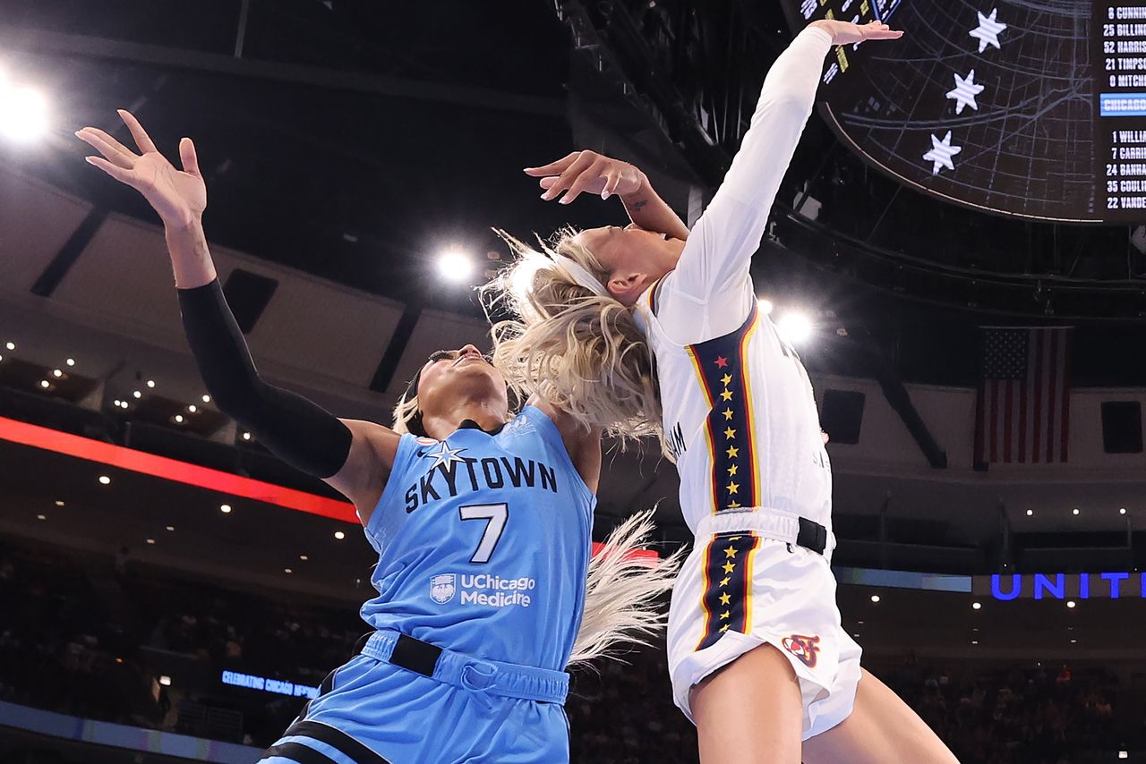 Sophie Cunningham #8 of the Indiana Fever is fouled by DiJonai Carrington #7 of the Chicago Sky during the first half at United Center on August 08, 2026 in Chicago, Illinois. DiJonai Carrington committed a hard foul on Sophie Cunningham during the Sky-Fever game on Saturday, Aug. 8Credit: Michael Reaves/Getty