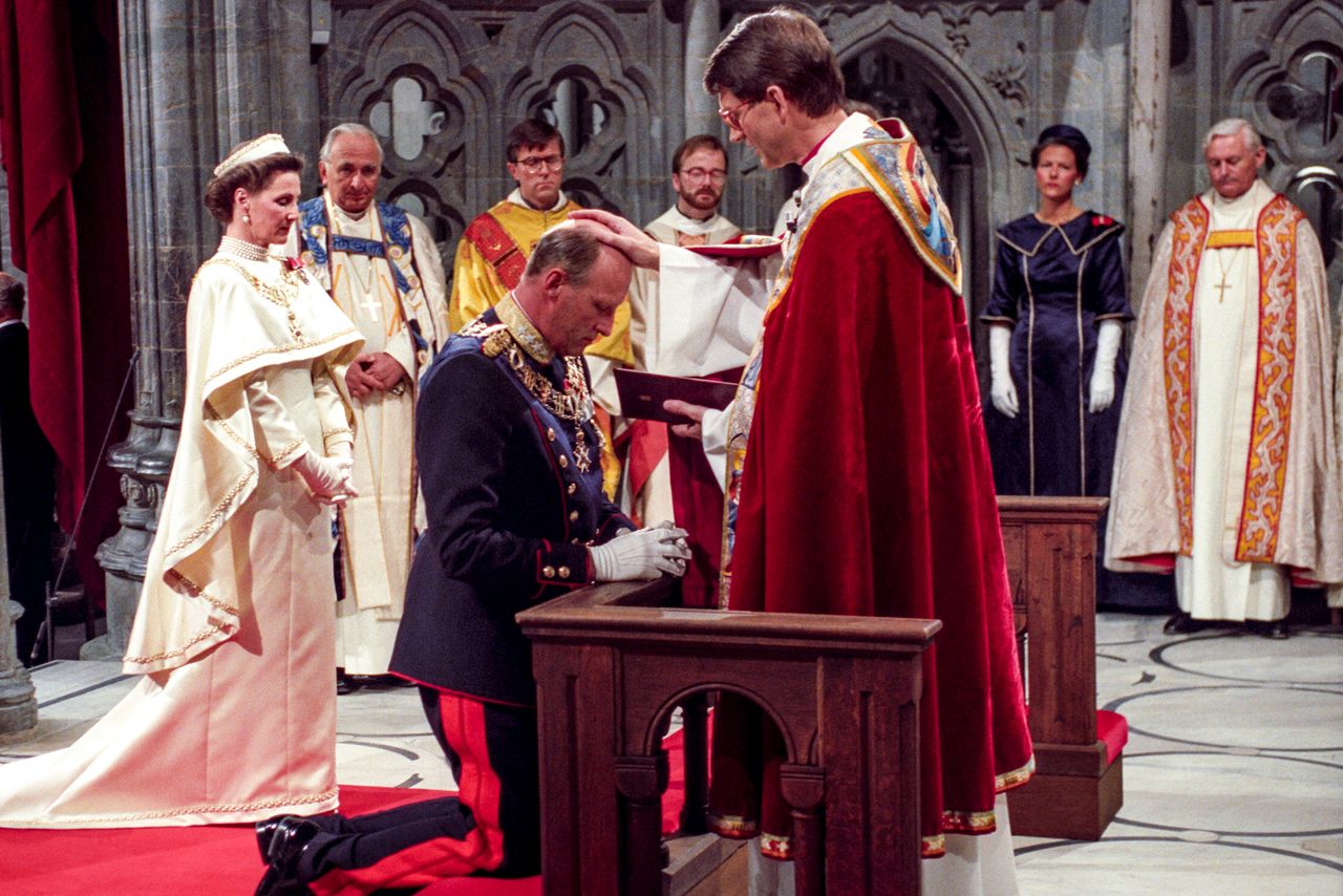 King Harald V being signed in by Bishop Finn Wagle, together with Queen Sonja King Harald V is signed in by Bishop Finn Wagle, together with Queen Sonja, at Nidaros Cathedral, in Oslo, Norway, on June 23, 1991Credit: NTB/AFP via Getty Images