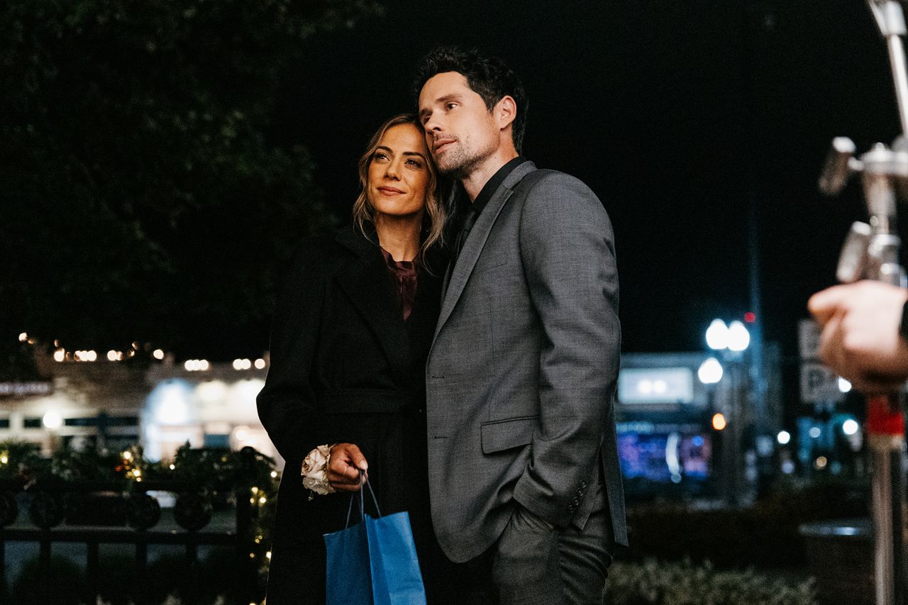 Jana Kramer and Benjamin Hollingsworth in The Christmas RingCredit: dkupishproductions