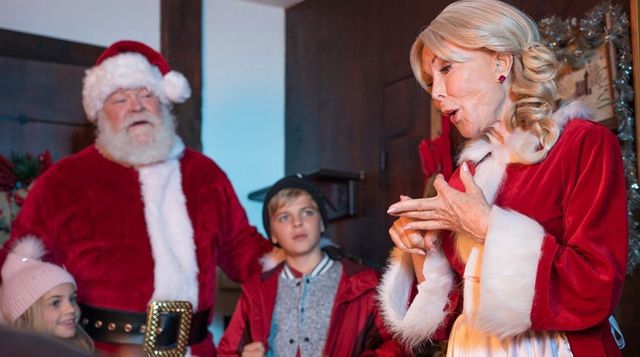 Barbara Eden, Dante Scalia, and Erick Devine in My Adventures with Santa Credit: Universal Studios