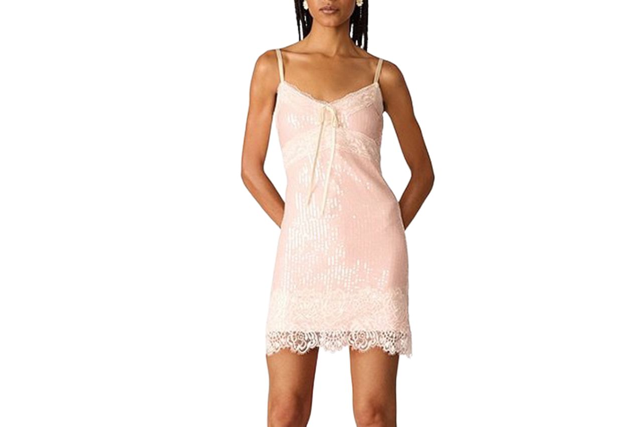 Betsey Johnson x Paris Hilton Sequin Embellished Lace Trim V-Neck Tie Front Dress Credit: Dillard's