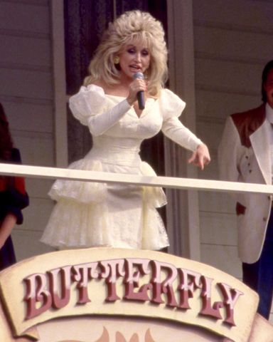 American singer-songwriter, actress, and businesswoman Dolly Parton, speaks to the crowd circa 1996 at Dollywood in Pigeon Forge, Tennessee. Dolly Parton in 1996Credit: Ron Davis/Getty