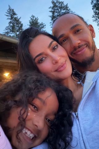 Kim Kardashian and Lewis Hamilton with her daughter, Chicago.Credit: Kim Kardashian/Instagram