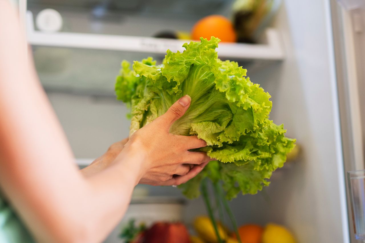 Woman holding lettuce (stock image)Credit: Getty