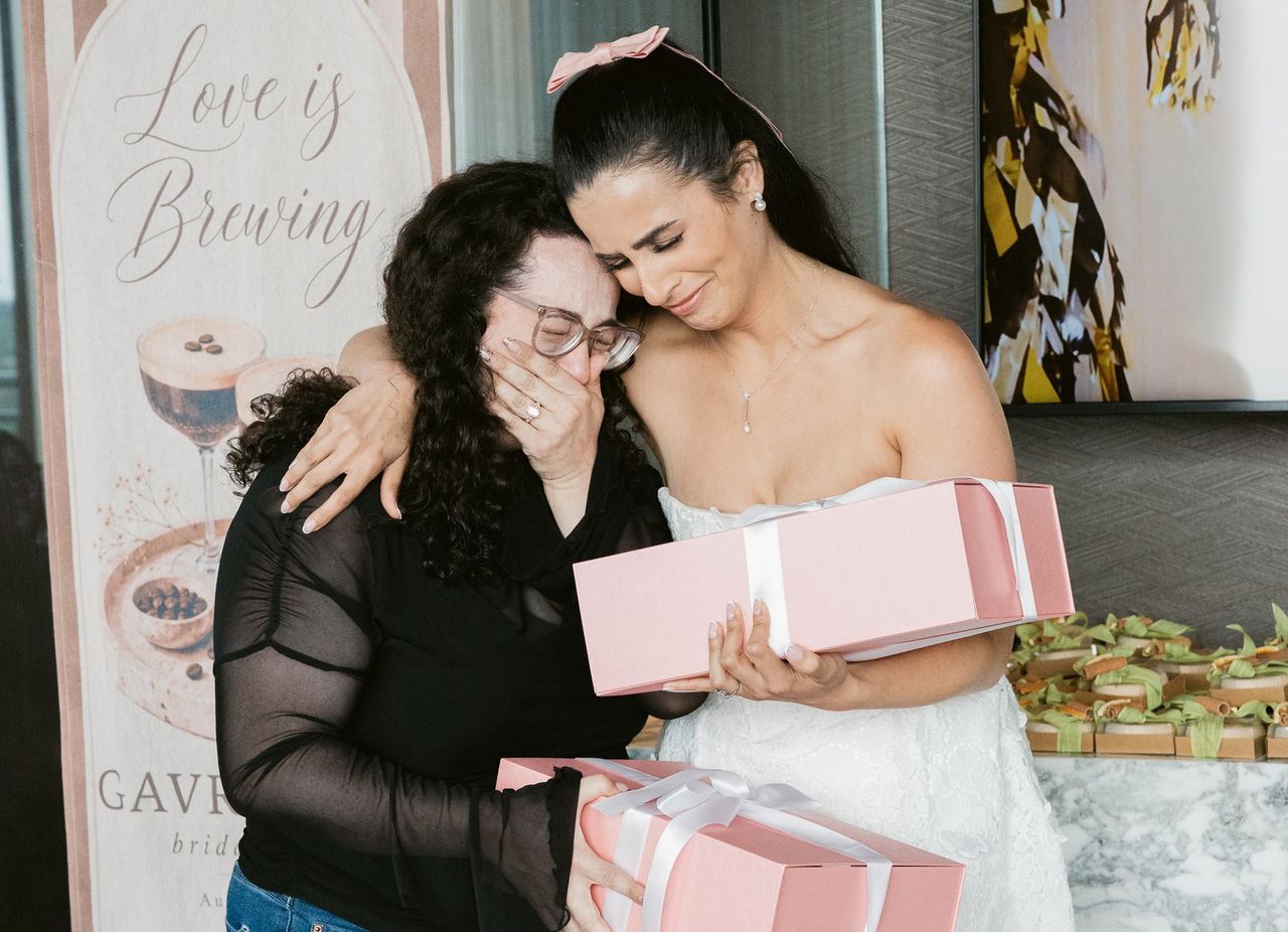 Mom Repurposes Wedding Dress for Her 3 Engaged Daughters Sisters Moriah and Gavriella KaufmannCredit: Alexa Negvesky Photography