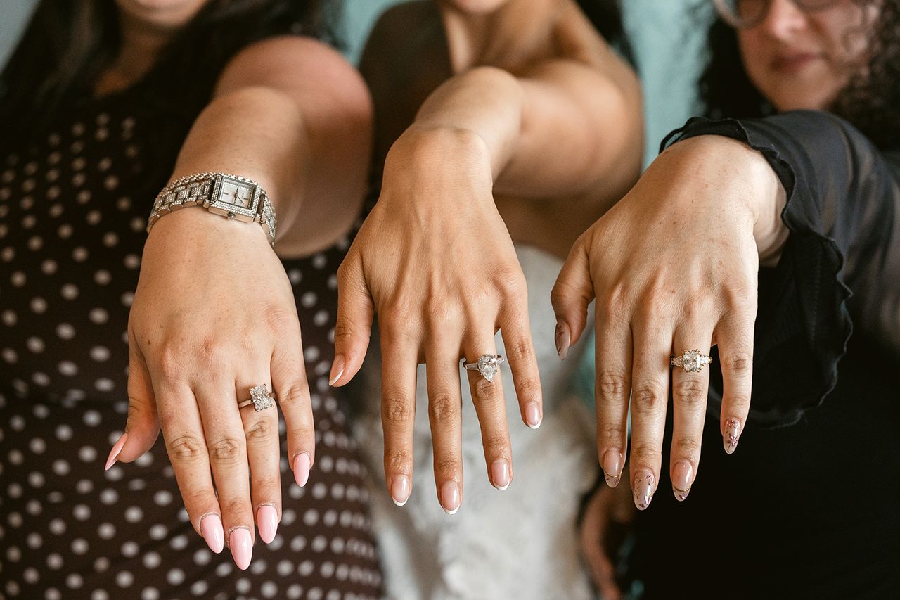 Mom Repurposes Wedding Dress for Her 3 Engaged Daughters From left to right: Daniella Kaufmann, Gavriella Kaufmann, and Moriah Kaufmann’s engagement ringsCredit: Alexa Negvesky Photography
