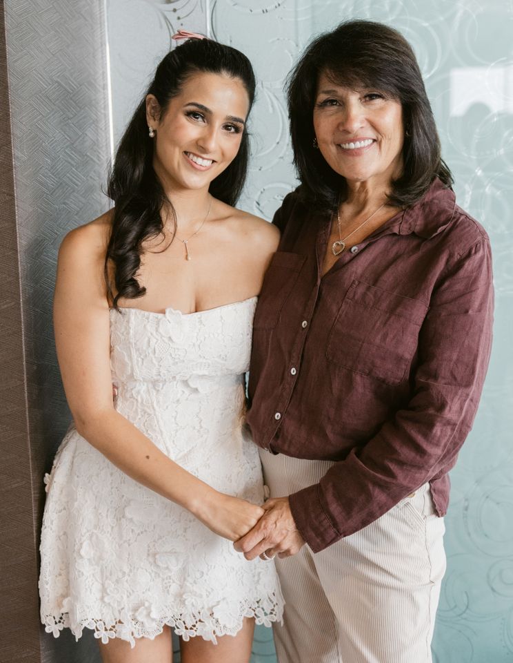 Mom Repurposes Wedding Dress for Her 3 Engaged Daughters Gavriella Kaufmann with mother Dena KaufmannCredit: Alexa Negvesky Photography