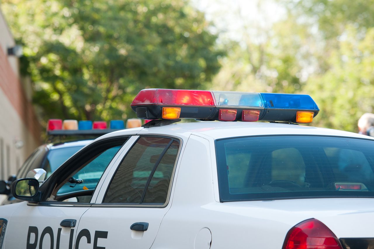 Careful, long exposure using tripod to capture flashing police car lights during daylight. Police car (stock image)Credit: Getty