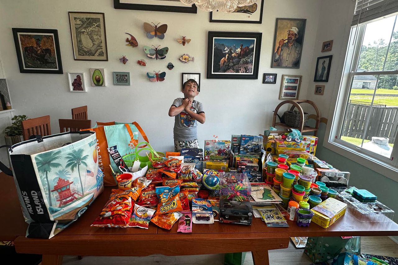 Mom Asked Neighbors to Let Her Son, Soren, with Autism Trick-or-Treat for His Birthday. Their Response Left Her Speechless Soren with all his gifts and snacks from his neighborsCredit: Leah Farrow