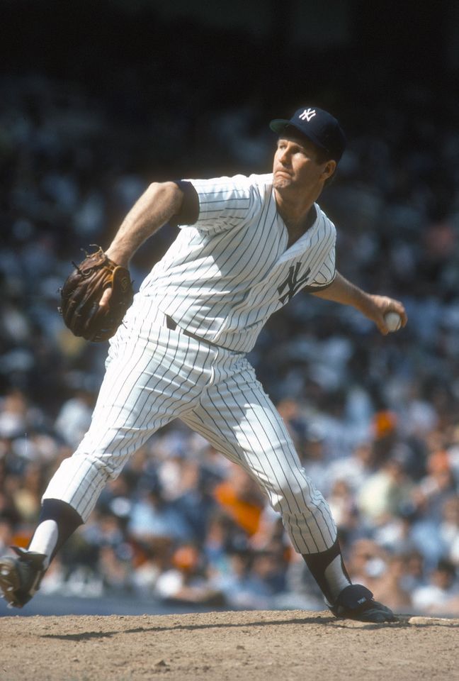 Tommy John of the New York Yankees pitches during a game at Yankee Stadium circa 1979Credit: Focus on Sport/Getty