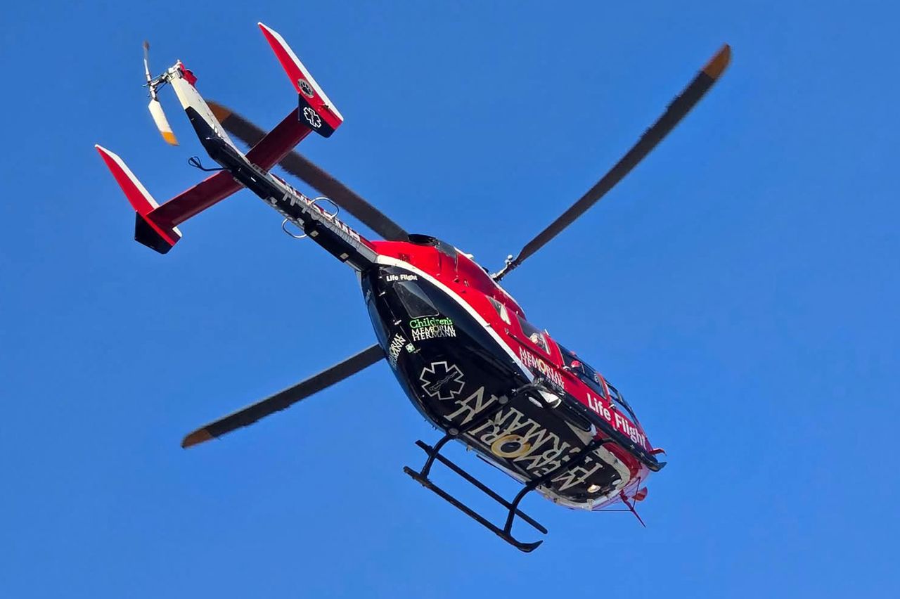 A Life Flight helicopter arrives at the scene after a 2-year-old child was found in a swimming poolCredit: Pct4Constable/X