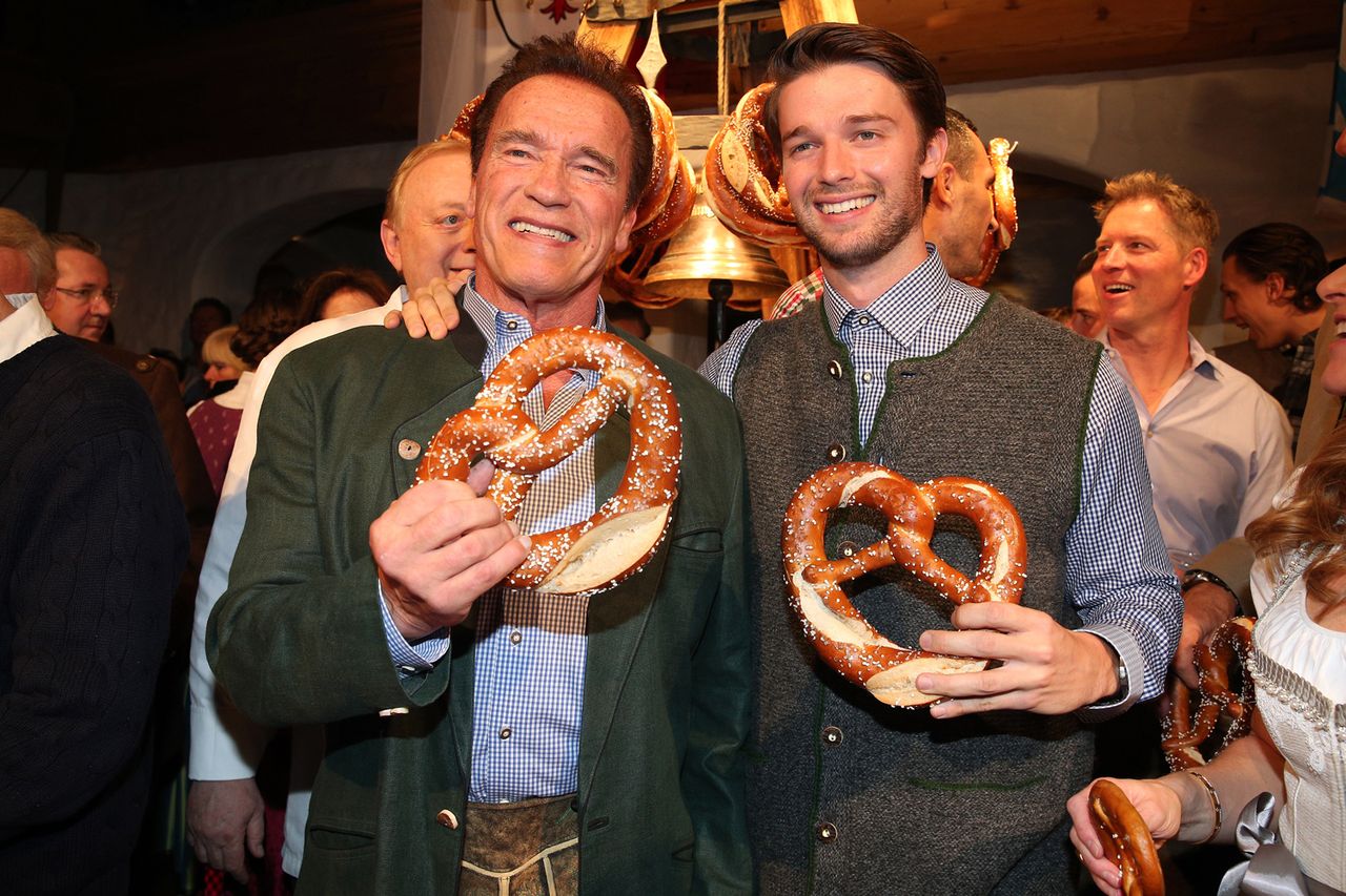 Arnold Schwarzenegger and his son Patrick Schwarzenegger during the 27th Weisswurstparty at Hotel Stanglwirt on January 19, 2018 in Going near Kitzbuehel Austria. Arnold Schwarzenegger and Patrick SchwarzeneggerCredit: Gisela Schober/Getty