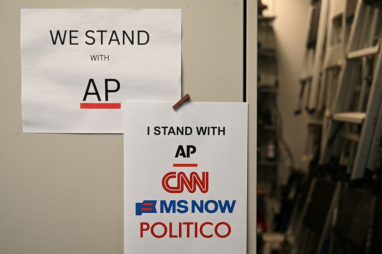 Posters stating We Stand with AP and I Stand with AP CNN MS Now Politico pinned on a wall Flyers in the White House Briefing Room on Sept. 21, 2026Credit: Alex WROBLEWSKI / AFP via Getty