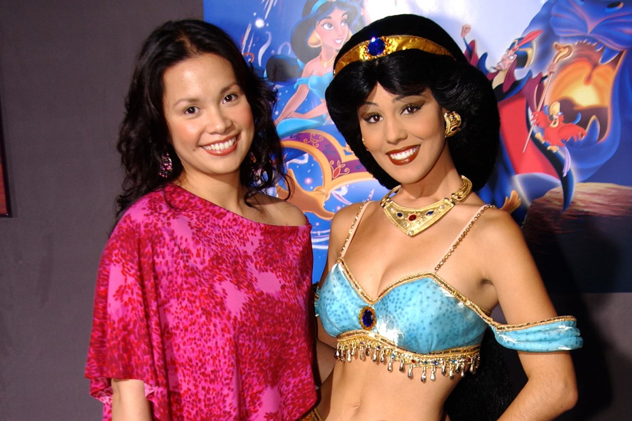Lea Solanga, singing voice of Princess Jasmine posing with a Princess Jasmine character, September 30, 2004. Lea Solanga, singing voice of Princess Jasmine posing with Princess Jasmine characterCredit: Mike Guastella/WireImage