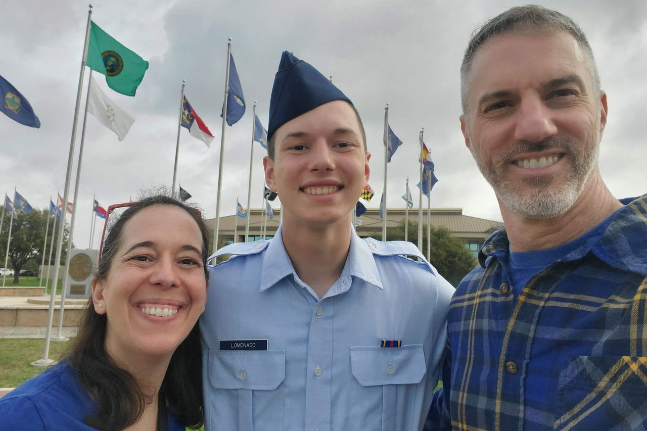Michael Lomonaco (right) with loved ones.Credit: Courtesy of Michael Lomonaco