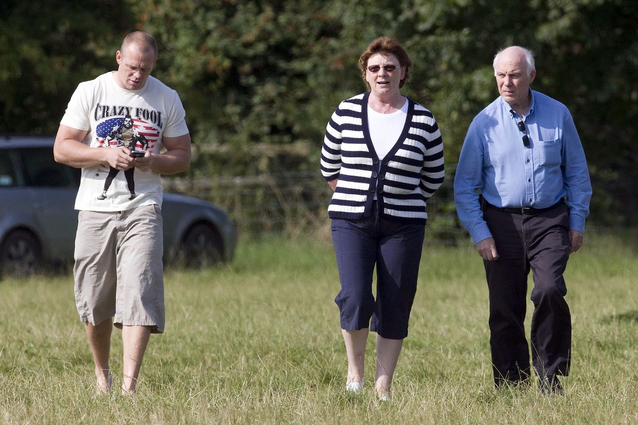 Mike Tindall with his parents Phil and Linda. Mike Tindall with his parents Phil and LindaCredit: David Hartley/Shutterstock