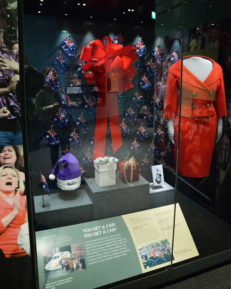 A display of objects from the car giveaway episode of One of the bows from Oprah’s 2004 care giveaway at the National Museum Of African American History & CultureCredit: Shannon Finney/Getty
