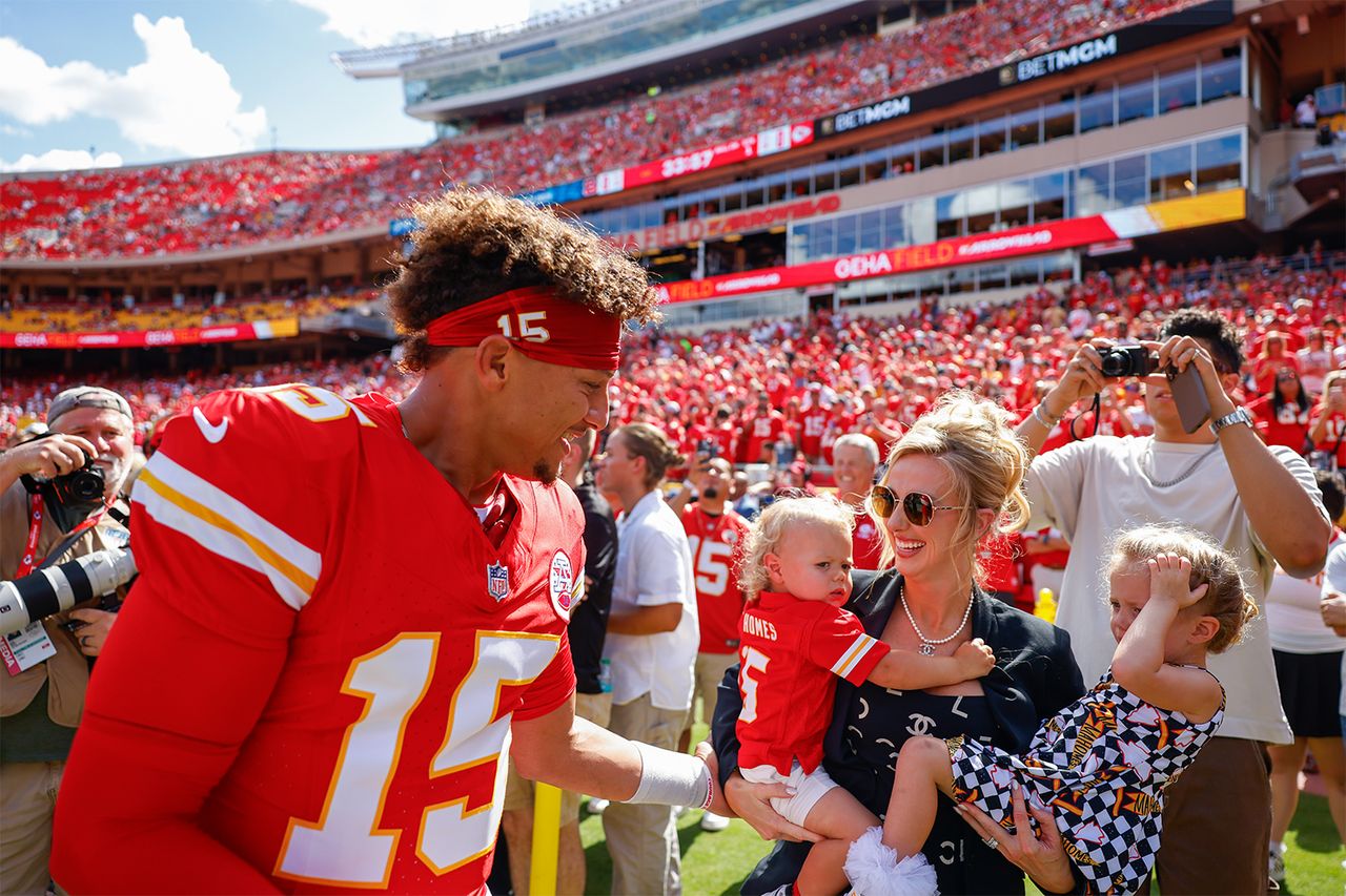 Patrick Mahomes #15 of the Kansas City Chiefs greets his wife, Brittany Mahomes and their two children Patrick Bronze Lavon Mahomes and Sterling Skye Mahomes prior to the game against the Cincinnati Bengals at GEHA Field at Arrowhead Stadium on September 15, 2024 in Kansas City, Missouri. Patrick and Brittany Mahomes on Sept. 15, 2024Credit: David Eulitt/Getty