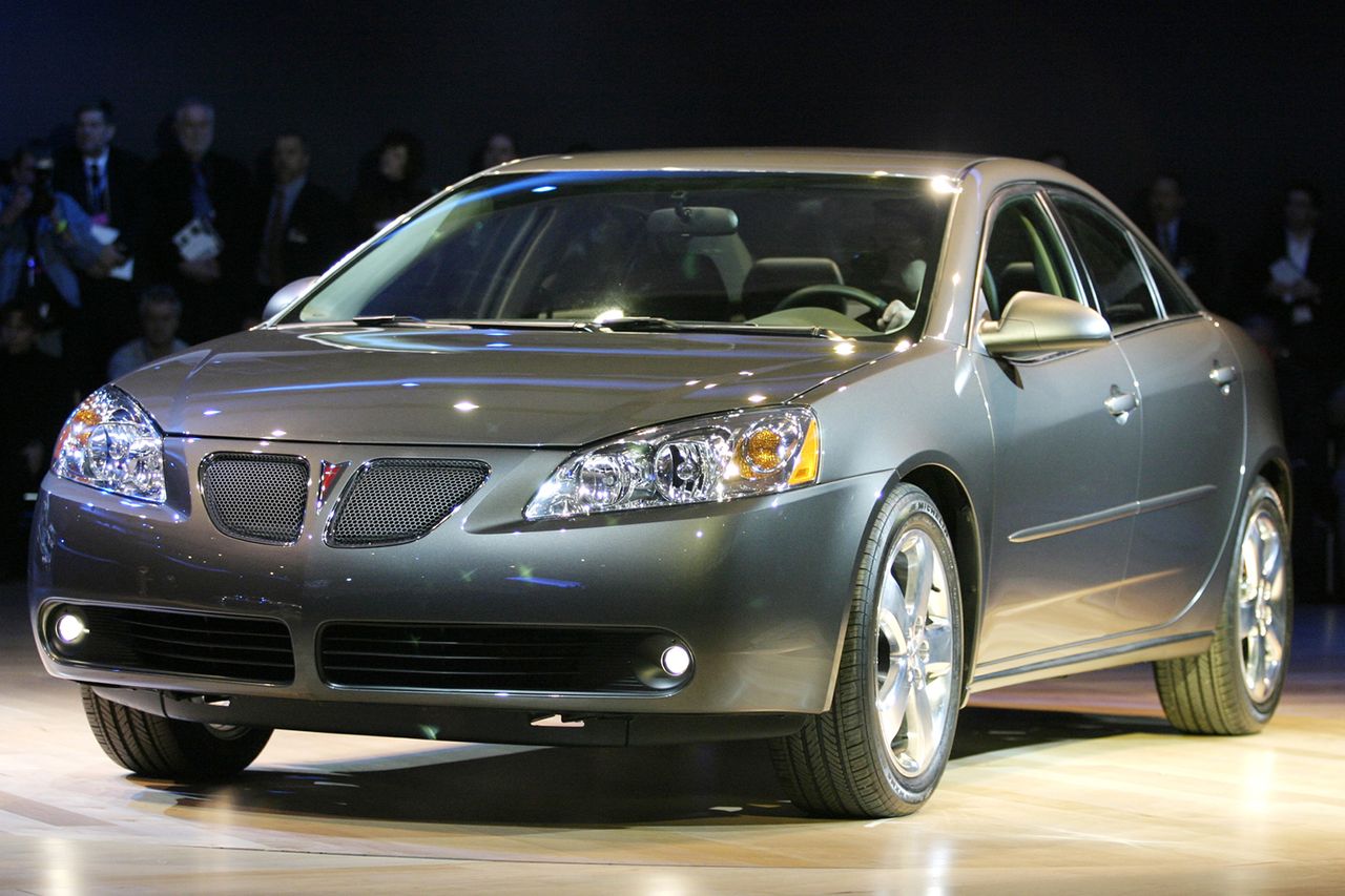 Pontiac's G6 is unveiled during the North American International Auto Show at Cobo Arena in Detroit, Michigan, Monday, January 5, 2004. A 2004 Pontiac G6Credit: Jeffrey Sauger/Bloomberg via Getty