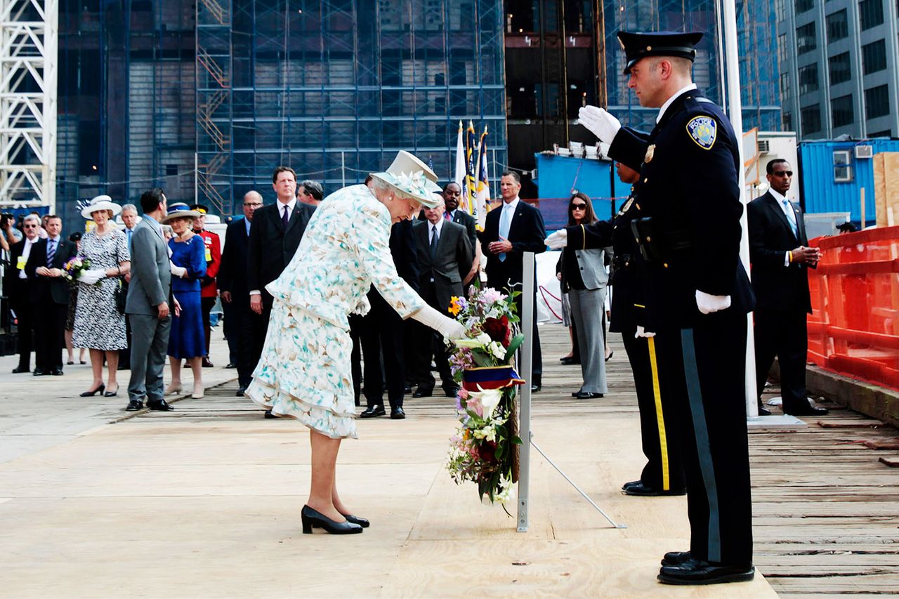 Queen Elizabeth lays a wreath in remembrance of the victims of the attacks on September 11, 2001, during a visits to Ground Zero at the World Trade Center site on July 6, 2010Credit: Lucas Jackson/Pool/Getty