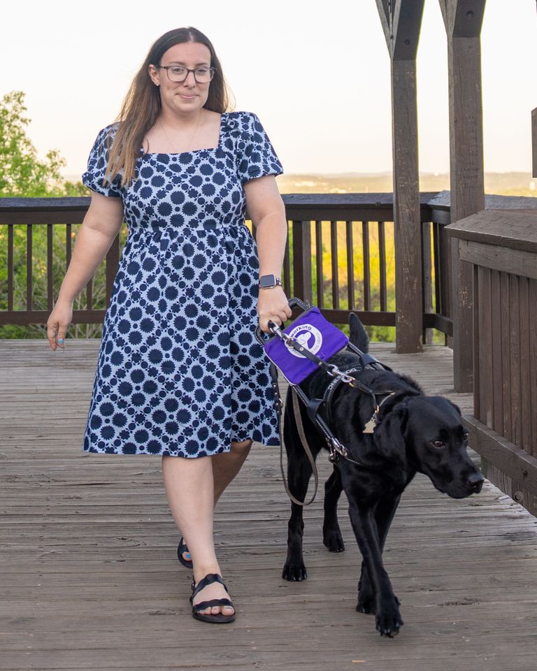 Rebecca Pacter and Bear Pacter and Bear on a walkCredit: Dogs Inc.