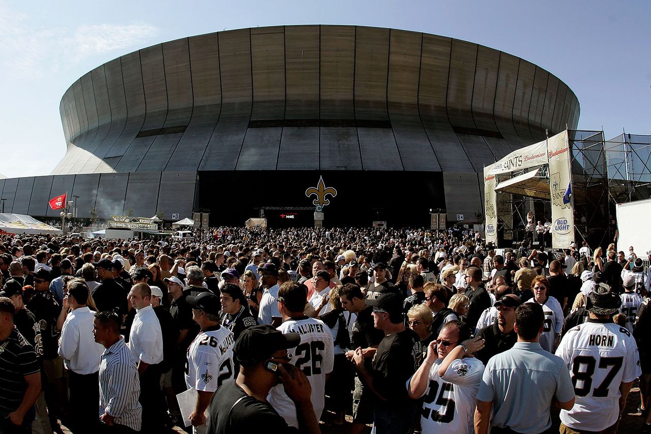 Fans gather outside the newly refurbished Superdome prior to the “Monday Night Football” game between the Atlanta Falcons and the New Orleans Saints on Sept. 25, 2006.Credit: Chris Graythen/Getty