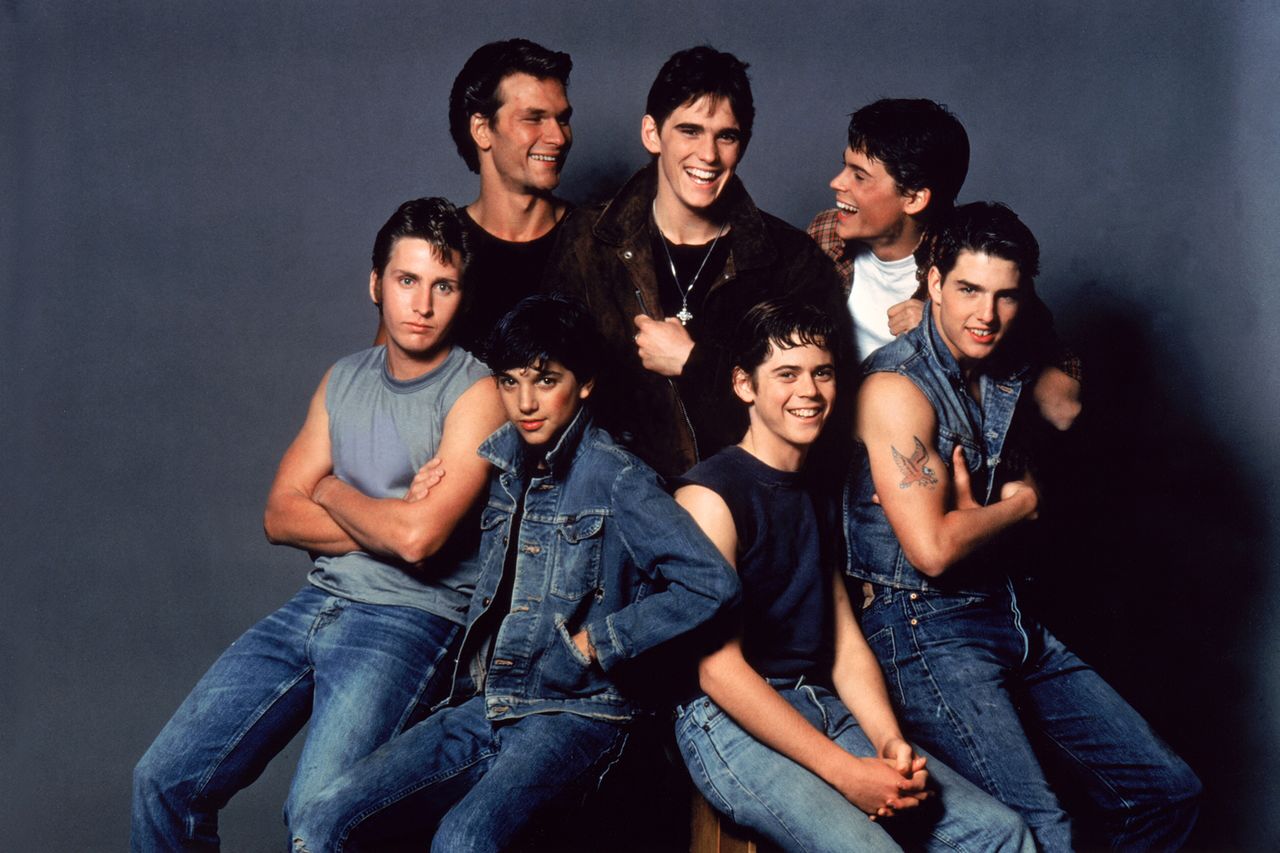 Patrick Swayze, Matt Dillon, Rob Lowe, Emilio Estevez, Ralph Macchio, Thomas C. Howell, and Tom Cruise on the set of The Outsiders, directed by Francis Ford Coppola. The cast of ‘The Outsiders’Credit: Sunset Boulevard/Corbis/Getty