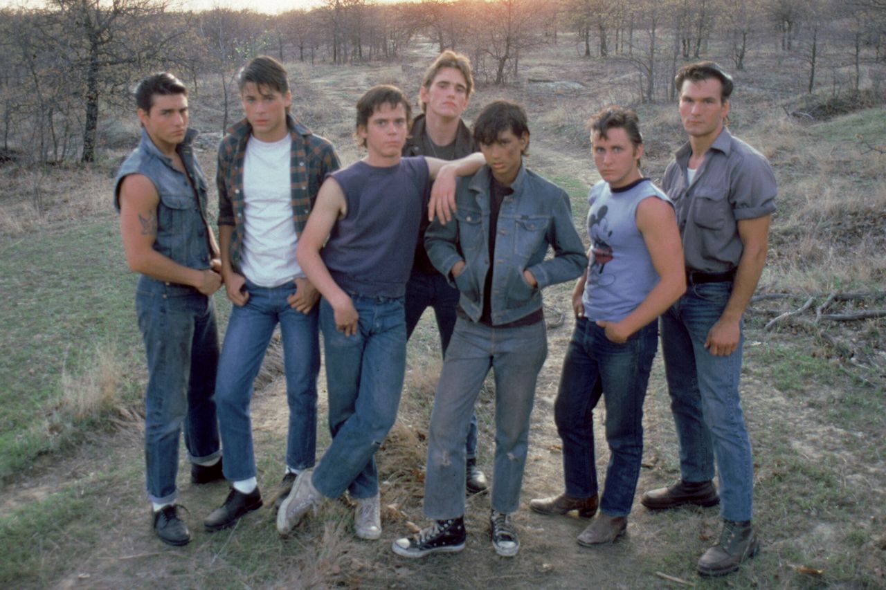 Tom Cruise, Rob Lowe, Thomas C. Howell, Matt Dillon, Ralph Macchio, Emilio Estevez, and Patrick Swayze on the set of The Outsiders, directed by Francis Ford Coppola. (Left-right:) Tom Cruise, Rob Lowe, Thomas C. Howell, Matt Dillon, Ralph Macchio, Emilio Estevez and Patrick Swayze on the set of ‘The Outsiders’Credit: Sunset Boulevard/Corbis/Getty