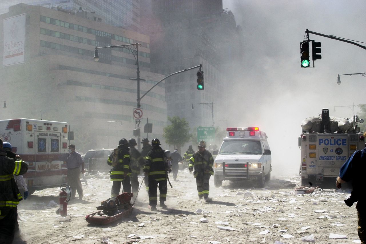 Rescue workers walk amongst the debris at Ground Zero after the attack on the World Trade Center on Sept. 11, 2001Credit: Matt Moyer/Corbis via Getty