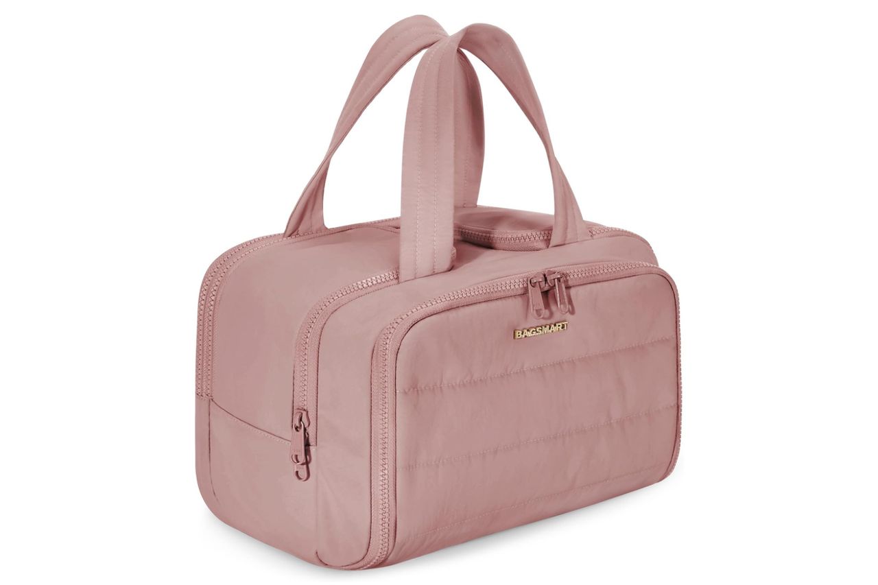 BAGSMART Travel Toiletry Bag, Lightweight Large Wide-open Travel Bag for Women, Puffy Cosmetic Makeup Bag Organizer with Handle for Accessories,Essentials, Toiletries, Dark Pink Credit: Amazon