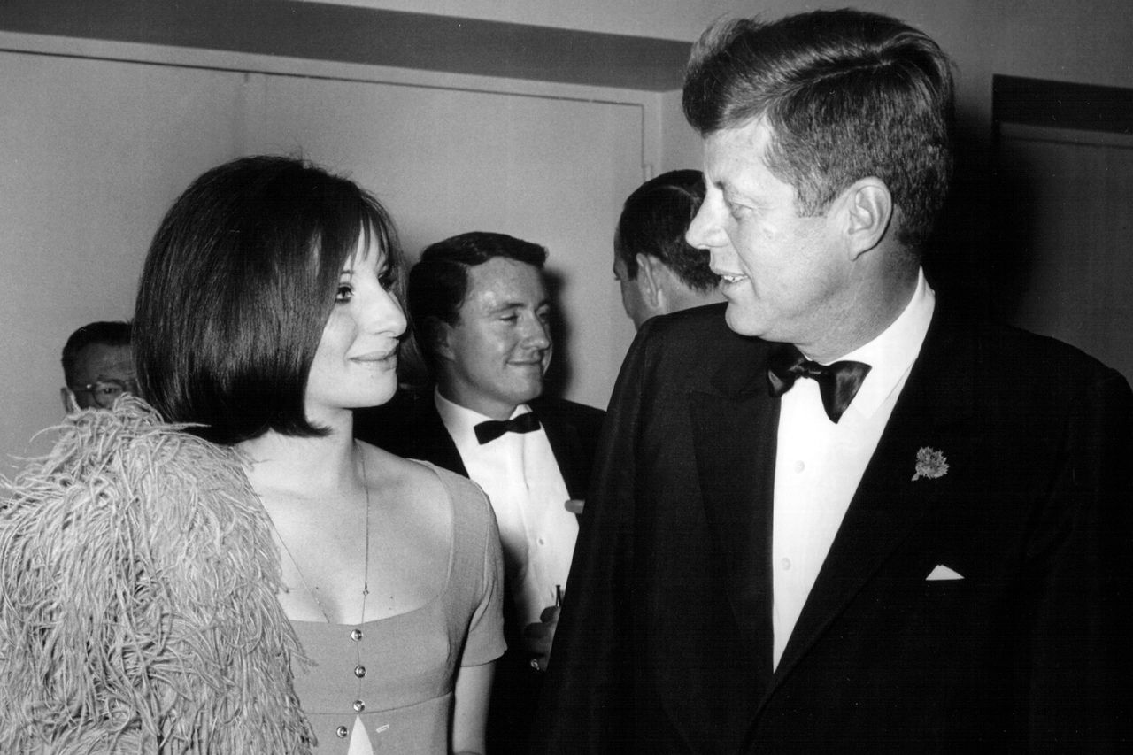 President John F. Kennedy speaks with Barbra Streisand at an event May 24, 1963. Barbra Streisand and President John F. Kennedy on May 24, 1963.Credit: National Archive/Newsmakers/Getty