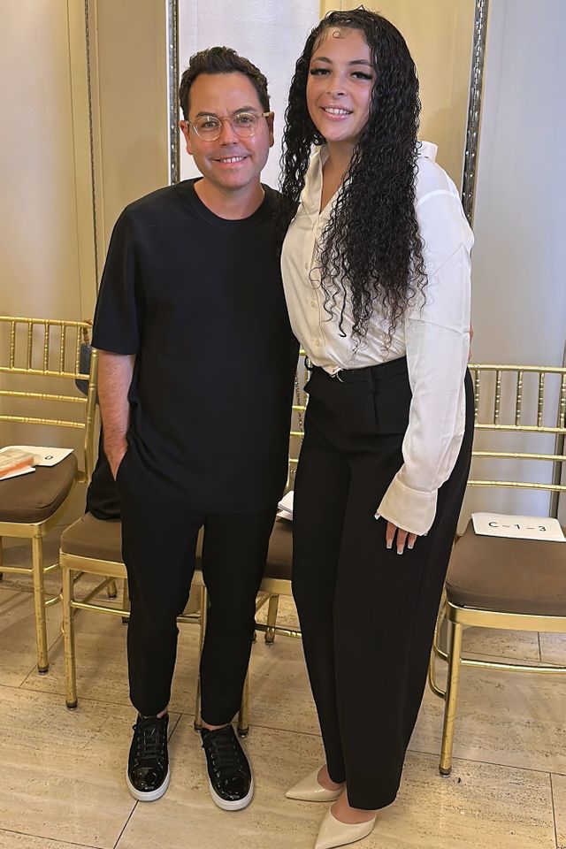A guest at the show with the designer Cyril Verdavainne and Nadaline Matos.Credit: Sophie Mannes for the Tom Coughlin Jay Fund