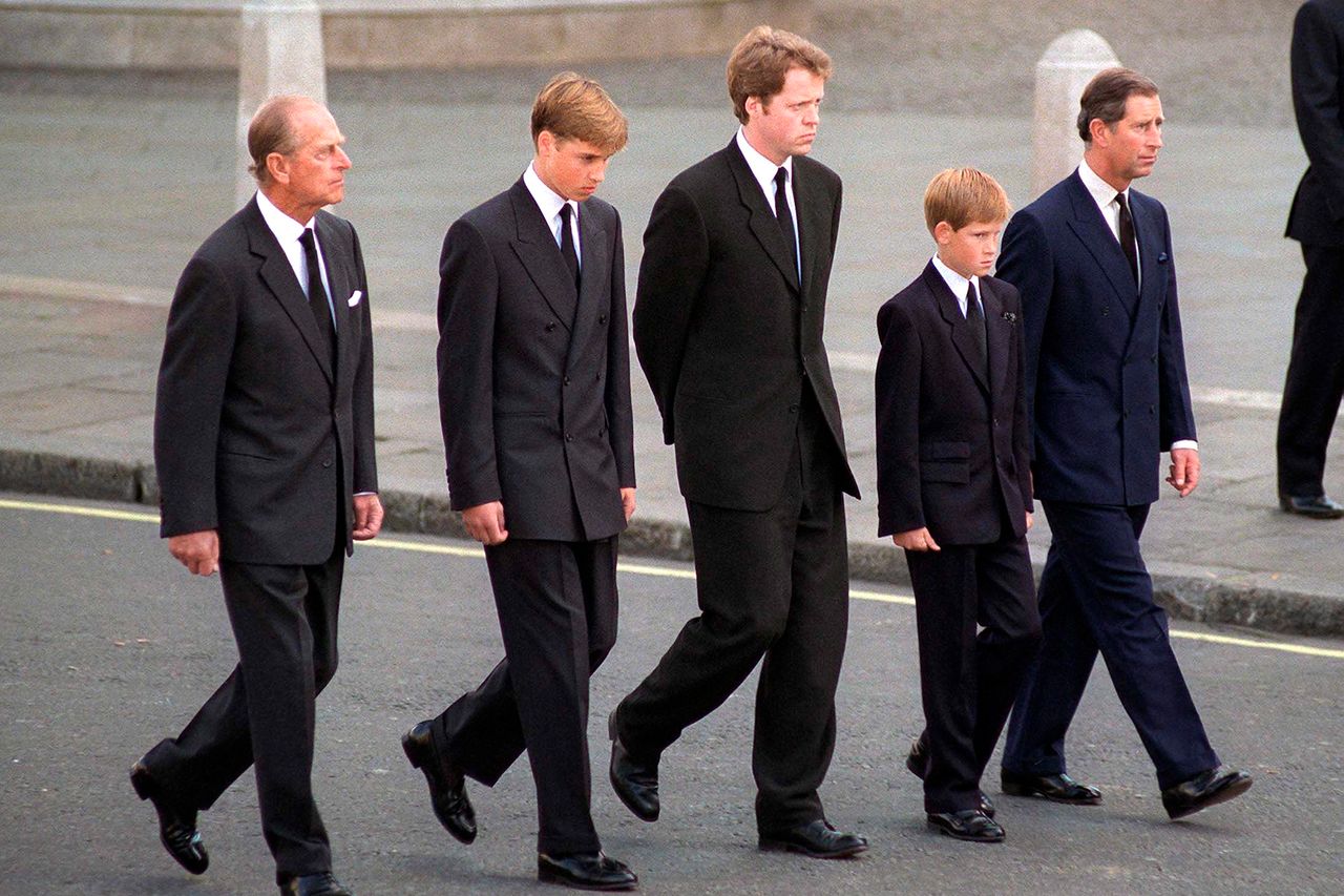 The Duke Of Edinburgh, Prince William, Earl Spencer, Prince Harry And The Prince Of Wales Following The Coffin Of Diana, Princess Of Wales From left: Prince Philip, Prince William, Charles Spencer, Prince Harry and Prince Andrew walk behind Princess Diana’s casket during her 1997 funeral procession in London.Credit: Tim Graham Photo Library via Getty