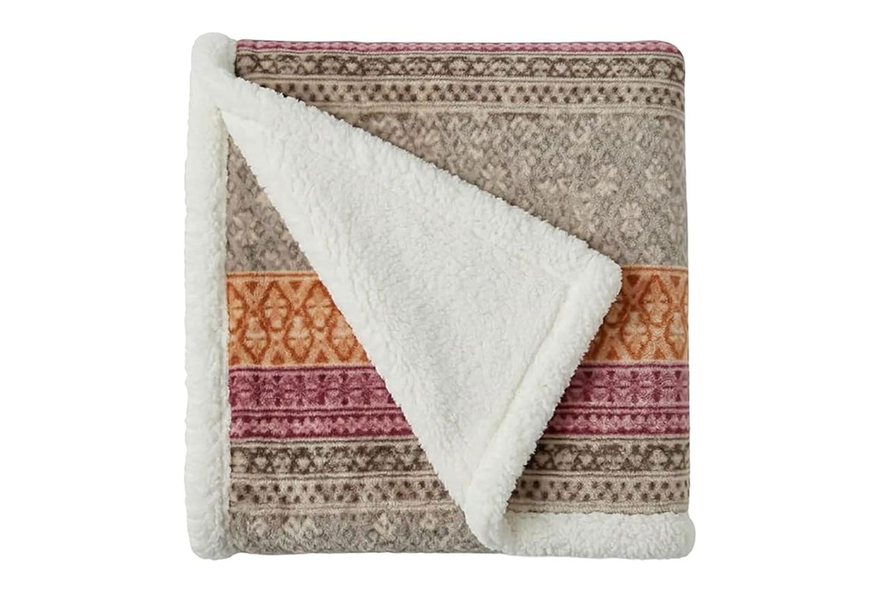 Eddie Bauer Sherpa Reverse Throw Blanket Credit: Amazon