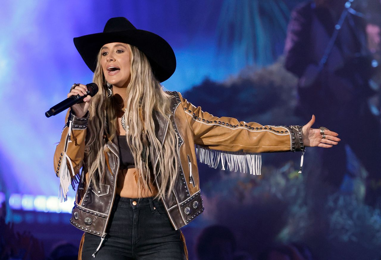 Lainey Wilson performs onstage during the 2024 People's Choice Awards held at Barker Hangar on Feb. 18, 2024, in Santa Monica, Calif. Lainey Wilson performs onstage during the 2024 People’s Choice Awards held at Barker Hangar on Feb. 18, 2024, in Santa Monica, Calif.Credit: Trae Patton/NBC/Getty