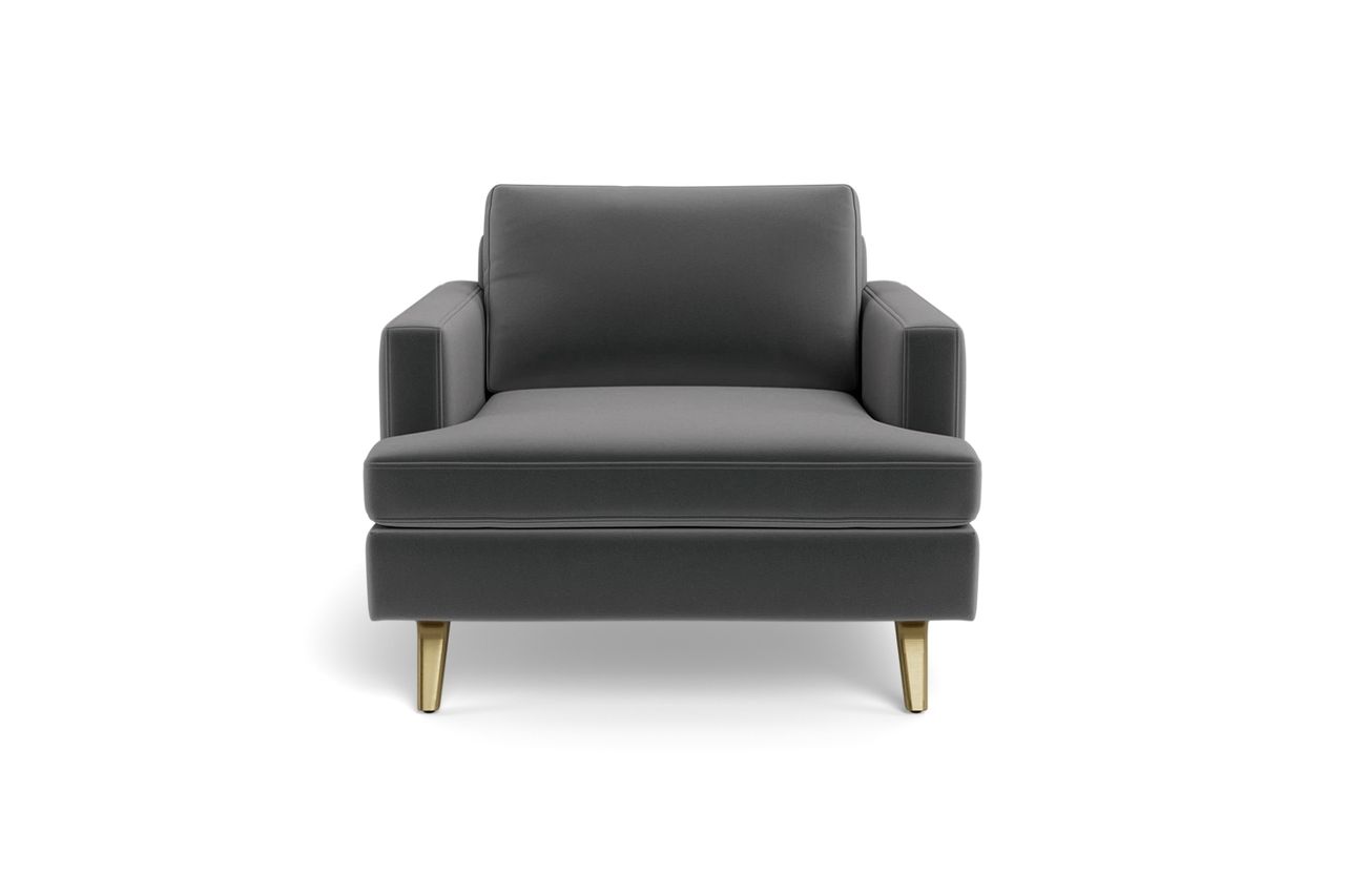 A modern armchair with a cushioned seat and backrest supported by sleek metallic legs Credit: Albany Park