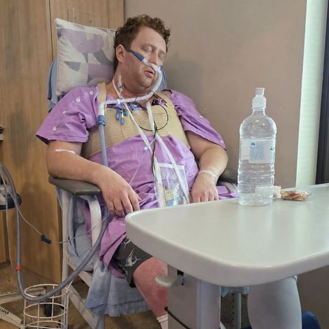 Luke Woodhouse in the hospital after developing sepsisCredit: Queensland Health/Facebook