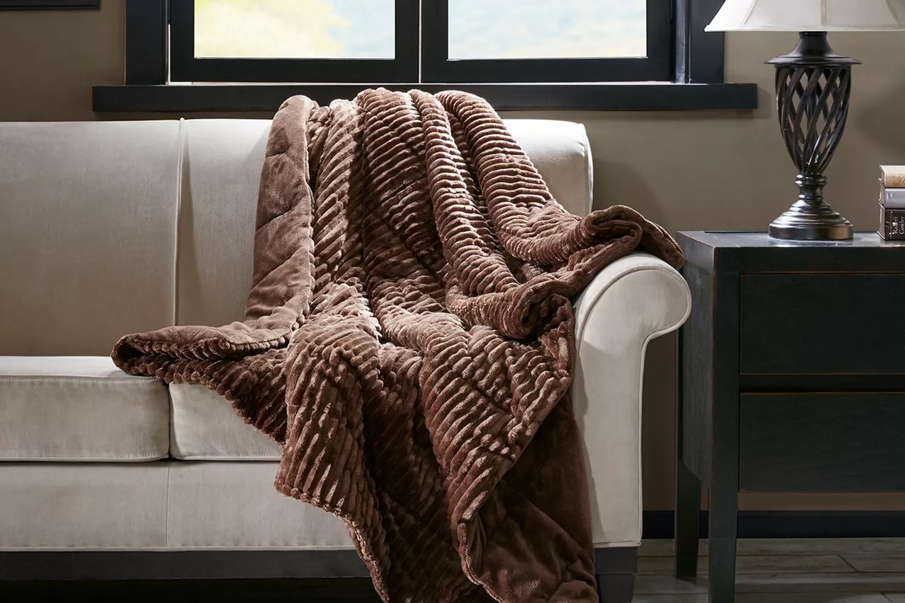 Madison Park Parker Plush Down Alternative Throw Credit: Macy's