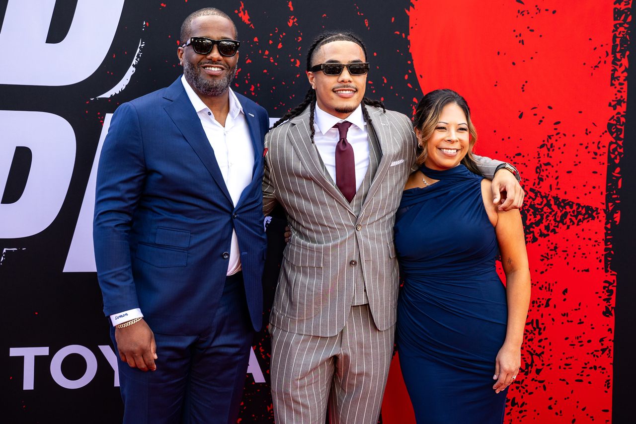 Makai Lemon and his parents during the 2026 NFL Draft.Credit: Brent Gudenschwager/ZUMA Press Wire/Shutterstock