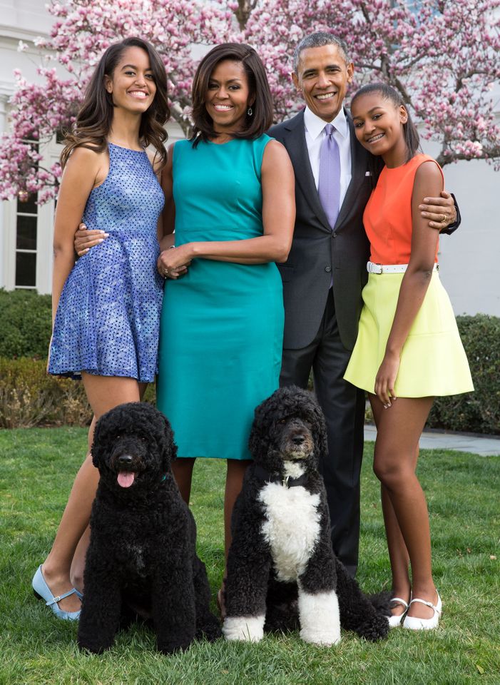 Michelle and Barack Obama with their daughters Malia and Sasha, and their dogs Bo and Sunny, in 2015Credit: Pete Souza/The White House via Getty