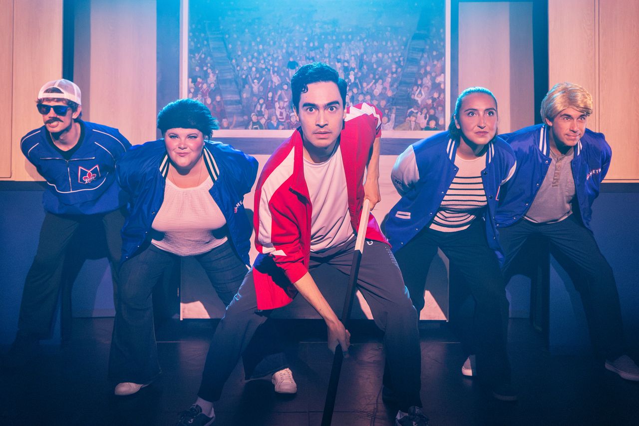 Troy Iwata in Heated Rivalry: The Unautohrized Musical Parody Troy Iwata (center) and the cast of ‘Heated Rivalry: The Unauthorized Musical Parody’Credit: Matthew Murphy