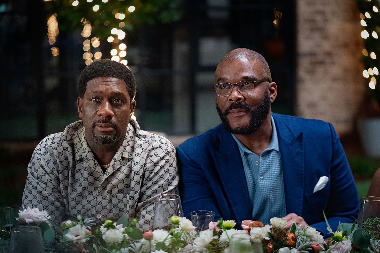 Tyler Perry and Richard T Jones seated at a decorated table Richard T. Jones and Tyler Perry in ‘Why Did I Get Married Again?’Credit: Chip Bergmann/Perry Well Films 2/Netflix